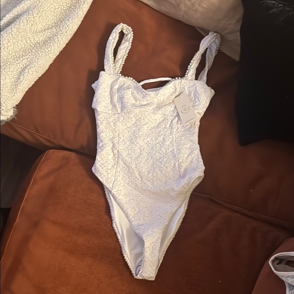 White Lace One Piece with Plunging Neckline and Sheer Design
